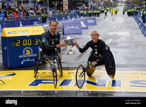 Marcel Hug, Susannah Scaroni win respective wheelchair divisions in 127th Boston Marathon